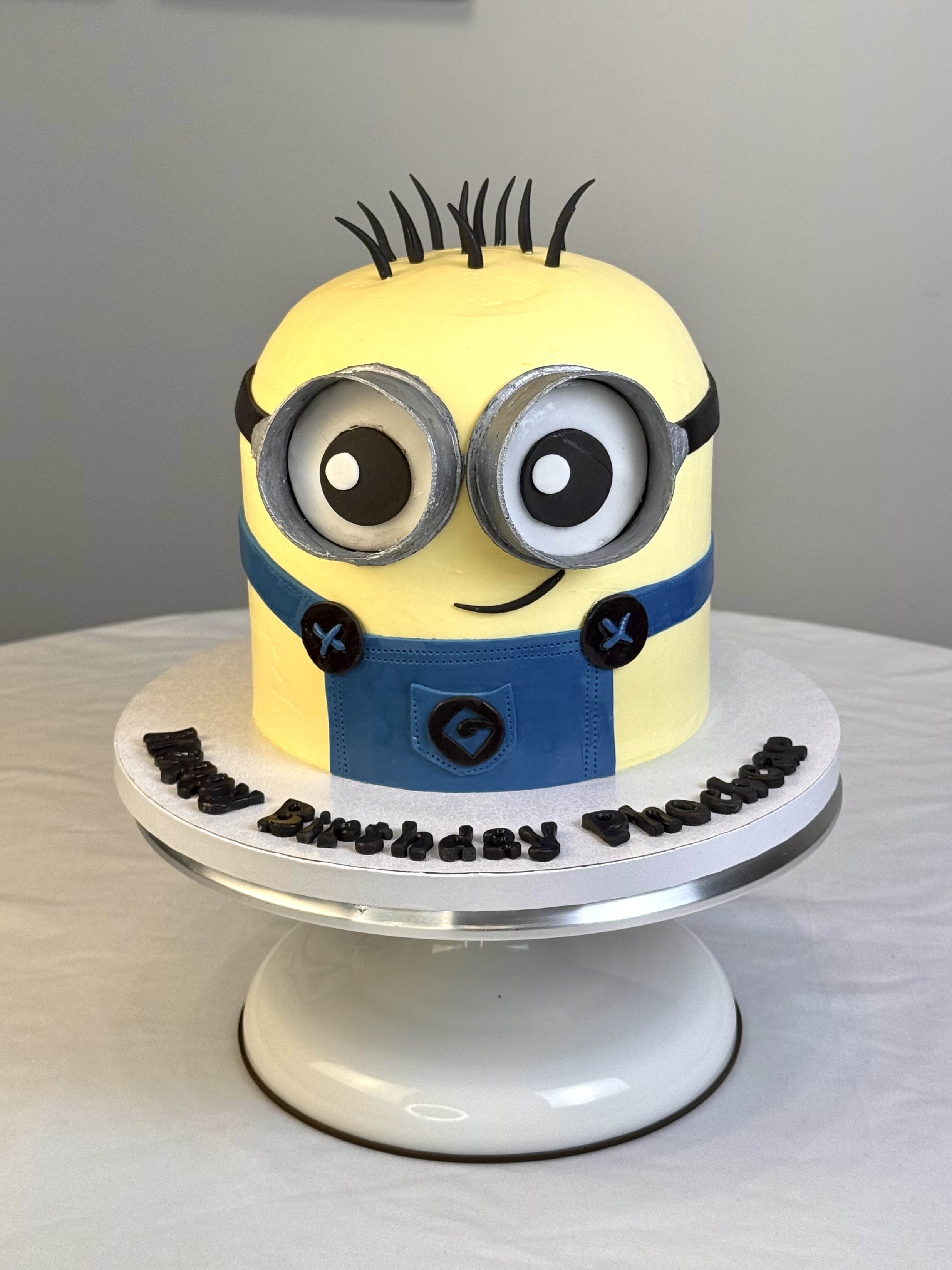 Minion character cake with fondant details